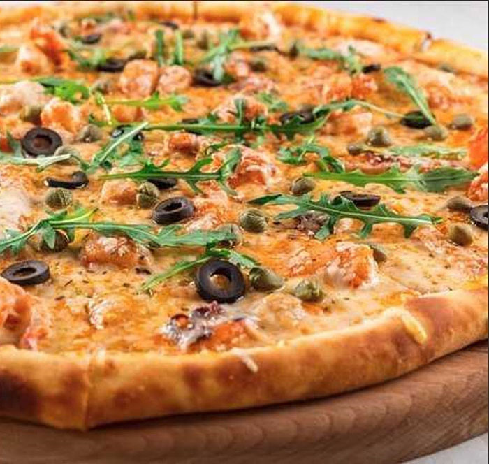 Caramelized Onion and Arugula Pizza recipe